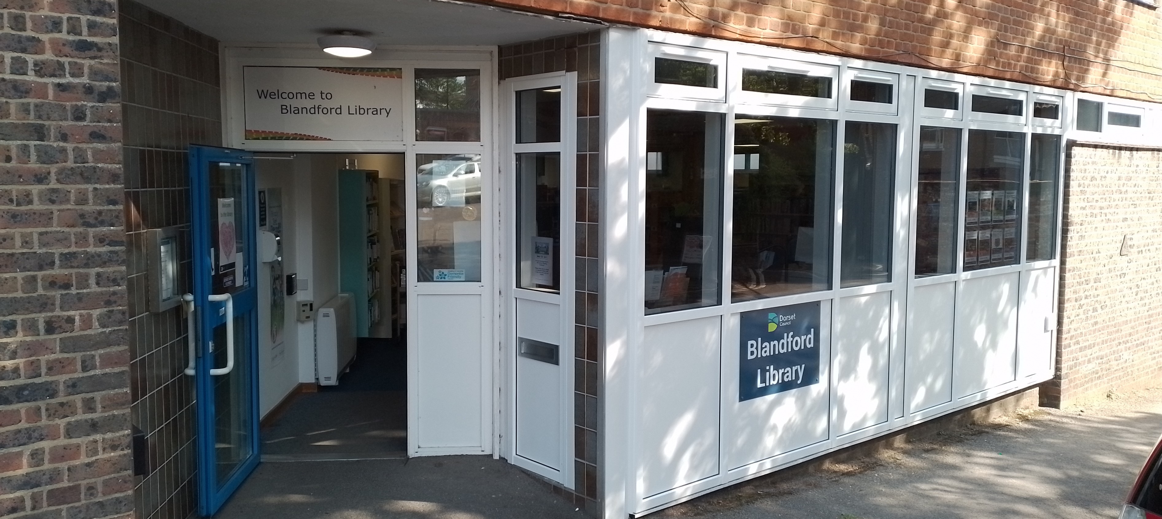 This is a picture of the entrance to Blandford Library.  The main door is open.