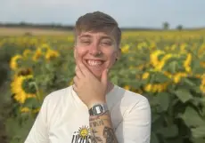 Picture of Shal in a sunflower field
