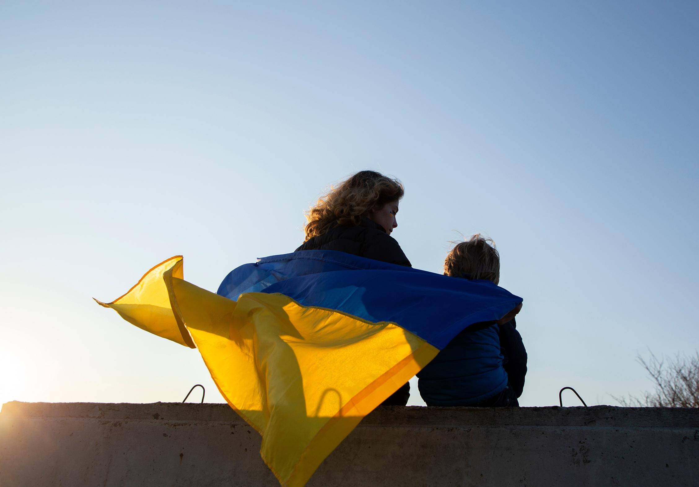 Mum and son with Ukrainian flag