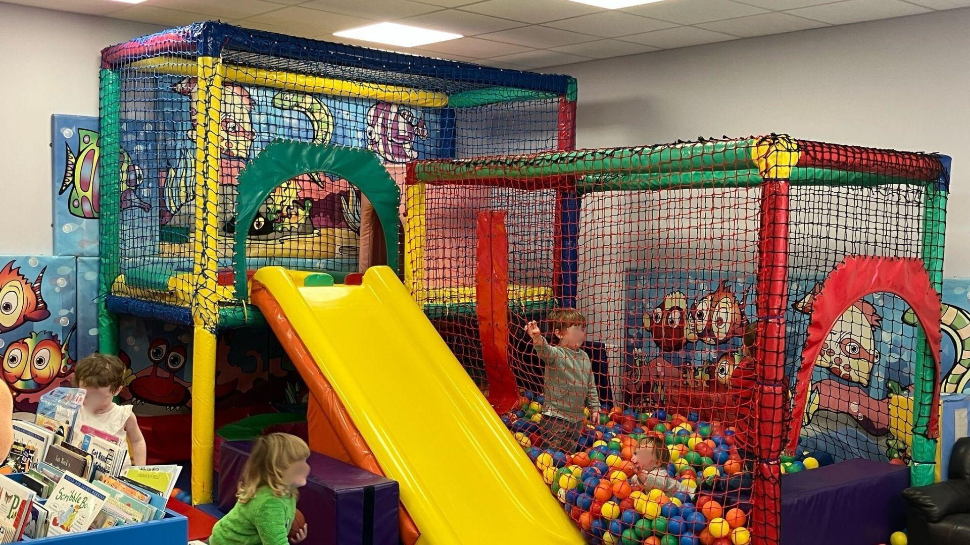 Children playing in the new play area