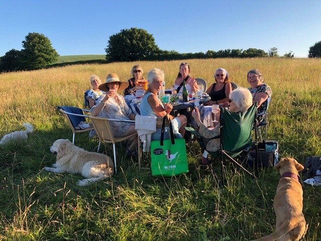 a group of people having a picnic