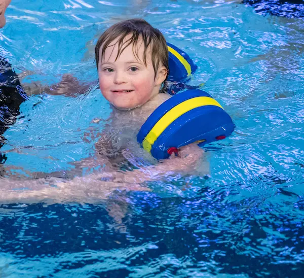 Young child swimming